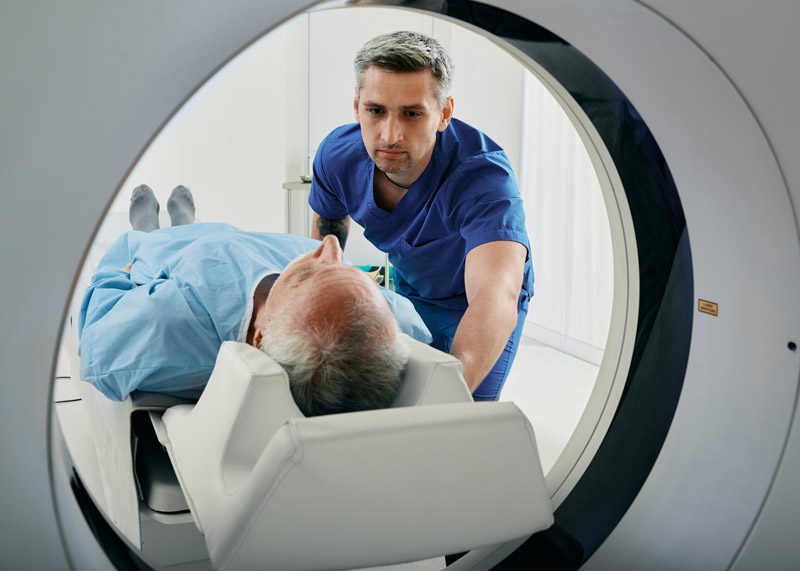Male-patient-undergoing-imaging-scan-for-traumatic-brain-injury
