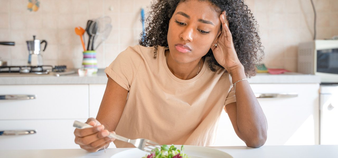 Woman-struggling-with-an-eating-disorder